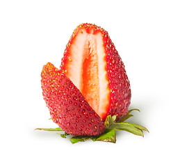 Image showing Juicy ripe strawberries with cut segment rotated