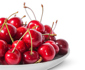 Image showing Closeup red sweet cherries in white plate