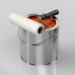 Image showing Paint roller and orange paint