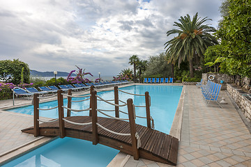 Image showing Luxury swimming pool with beautiful views of Lake Garda in Italy