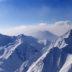 Image showing Snowymountains in early morning fog