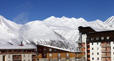 Image showing Snowy hotels in winter mountains at nice day