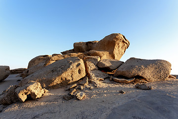 Image showing Rock formation in Namib desert in sunset, landscape