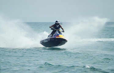 Image showing Man racing a watercraft