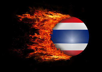 Image showing Flag with a trail of fire - Thailand