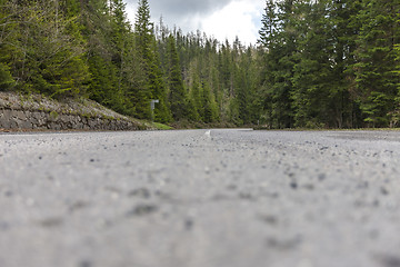 Image showing Winding road bends in  rural, desolate, mountain landscape.  Europe.