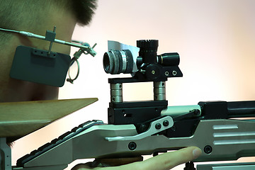 Image showing young man aiming a pneumatic air rifle