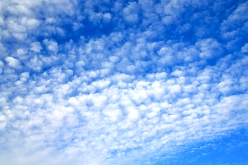 Image showing in the blue sky white soft clouds and  