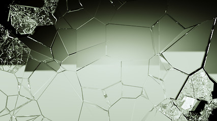 Image showing Demolished and cracked glass on black