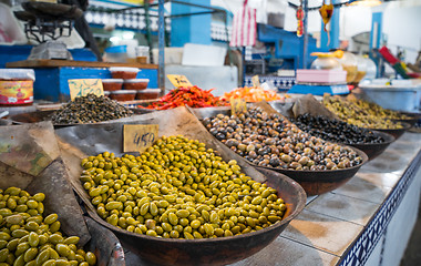 Image showing Olives on market counter in Eastern country