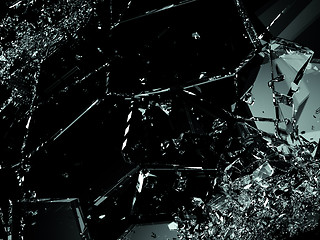 Image showing Shattered glass pieces on black background