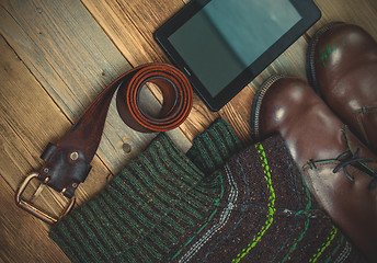 Image showing vintage belt, leather boots, sweater and digitizer 