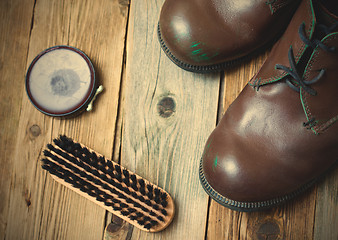 Image showing brown boots, shoe polish and shoe brush