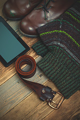 Image showing vintage boots, leather belt, sweater and digitizer