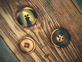 Image showing three vintage buttons