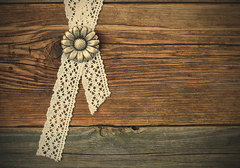 Image showing vintage metal buttons flowers and lace tape