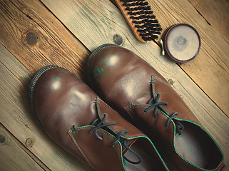 Image showing vintage boots brush and shoe polish