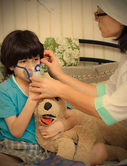 Image showing children\'s physician spends boy inhalation session