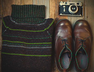 Image showing Vintage wool sweater, shoes and antique rangefinder camera