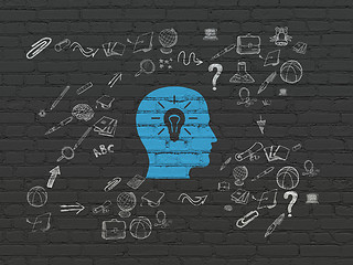 Image showing Learning concept: Head With Light Bulb on wall background