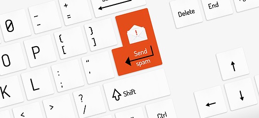 Image showing white keyboard with send spam key and envelope