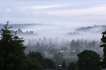 Image showing view of the small Finnish town in fog