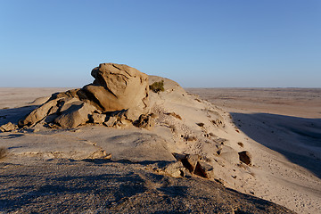 Image showing Rock formation in Namib desert in sunset, landscape