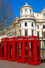 Image showing telephone in  obsolete box classic british icon