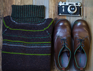 Image showing Vintage wool sweater, shoes and antique rangefinder camera