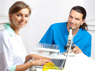Image showing Two young happy medical people