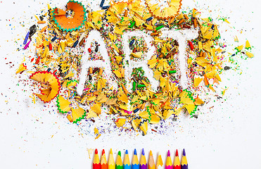 Image showing ART word on the background of colored shavings and pencils