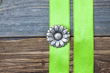 Image showing Vintage metallic button flower