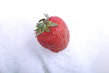 Image showing Close up strawberry in a cold ice