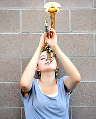 Image showing Female trumpet player.