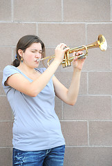 Image showing Female trumpet player.