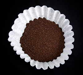 Image showing coffee in filter on black