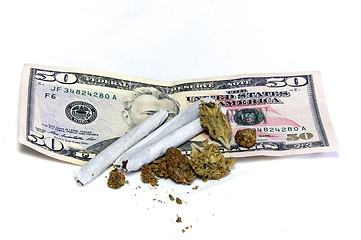 Image showing marijuana on top of money