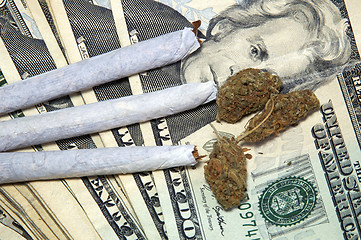 Image showing pot and money up close