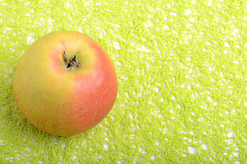 Image showing fresh apple on green background