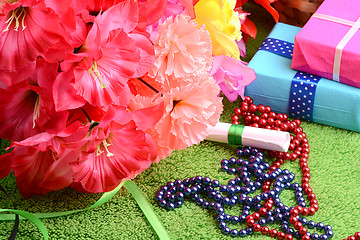 Image showing gift box set and artificial flower background