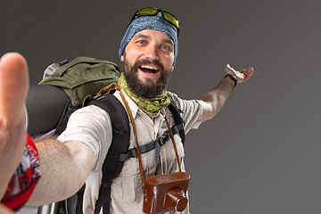 Image showing Portrait of a smiling male fully equipped tourist 