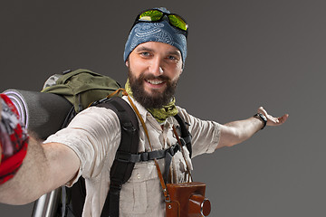 Image showing Portrait of a smiling male fully equipped tourist 