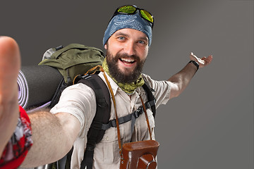 Image showing Portrait of a smiling male fully equipped tourist 