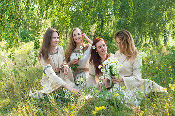 Image showing Beautiful women relaxing over nature background