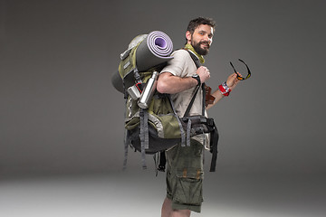 Image showing Portrait of a smiling male fully equipped tourist 