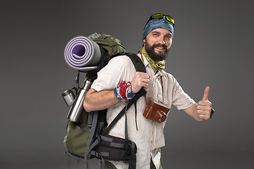 Image showing Portrait of a smiling male fully equipped tourist 