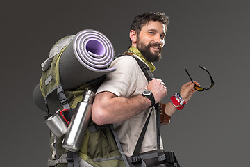 Image showing Portrait of a smiling male fully equipped tourist 