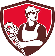 Image showing Plumber Wielding Monkey Wrench Shield Retro