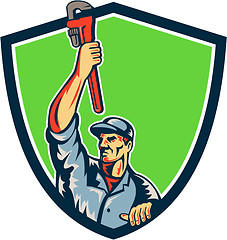 Image showing Plumber Raising Up Monkey Wrench Shield Retro