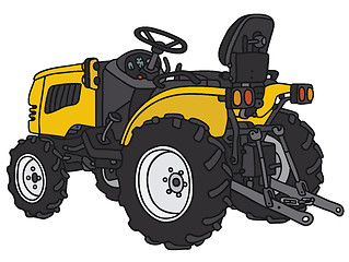 Image showing Yellow small tractor